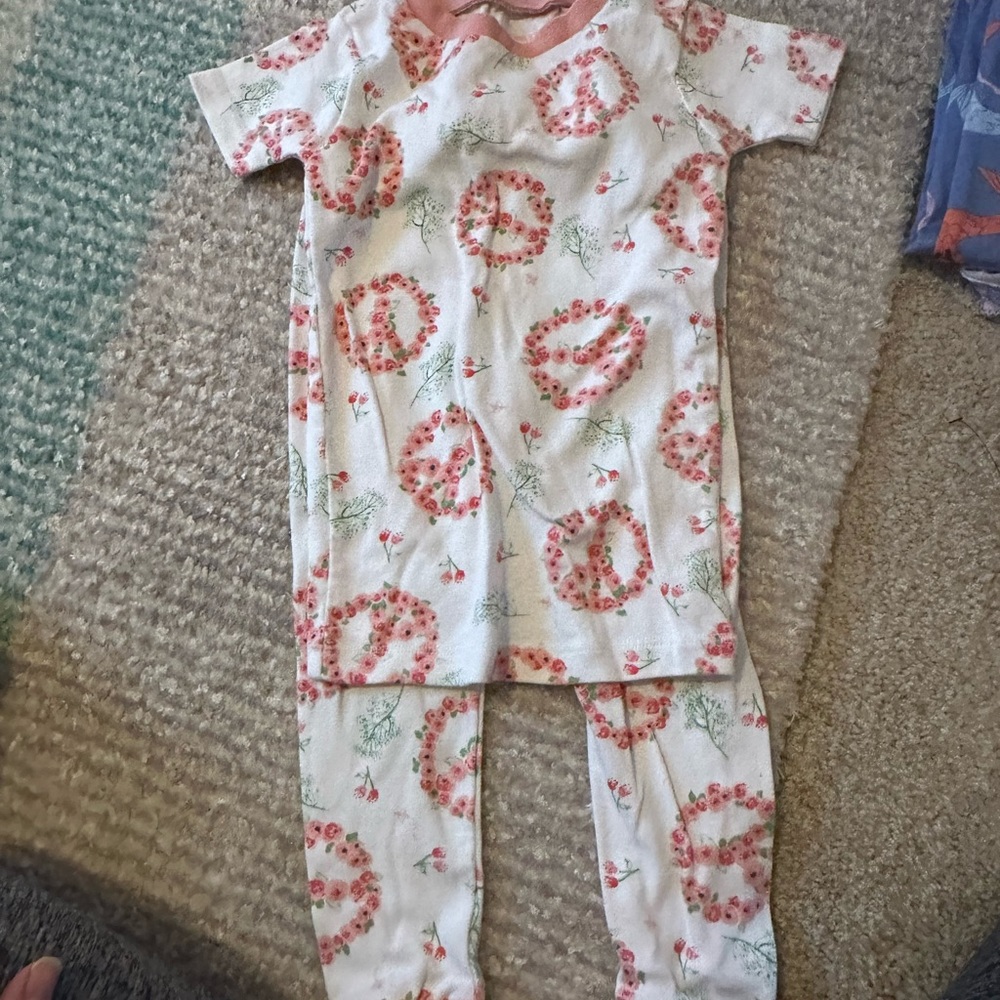 Burt’s bees peace/flowers pajamas. Brand new without tags, 3T